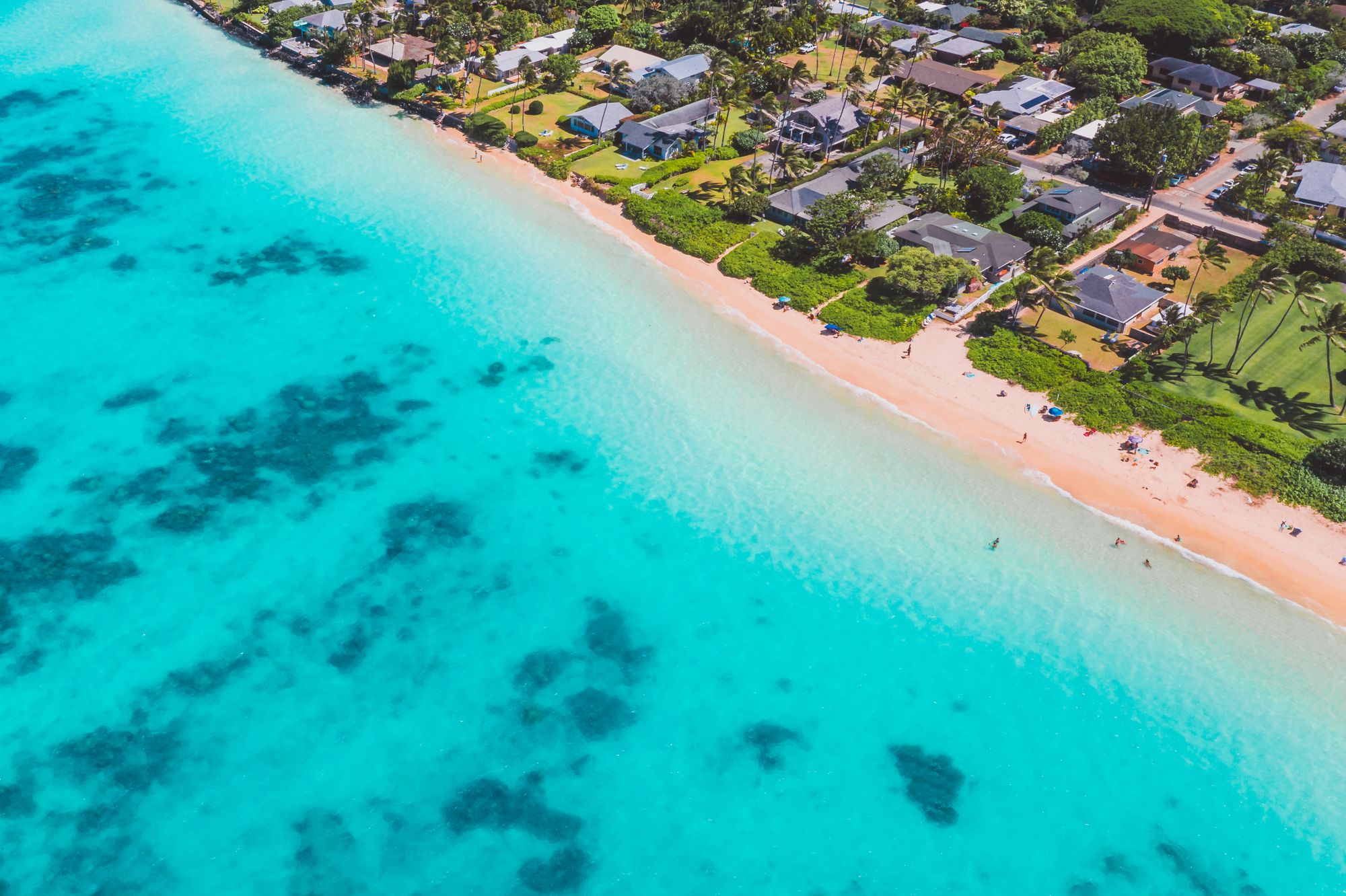 Market imagery: Stock photograph of homes along a tropical coastline